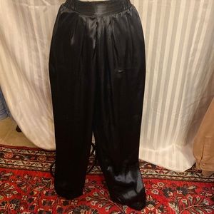 Ilyza size 7 shimmering Black dress pants 39 1/2” long from waist